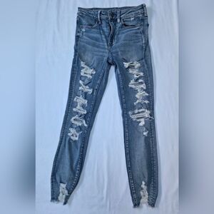 American Eagle NE(X)T LEVEL STRETCH Distressed Blue Jeans